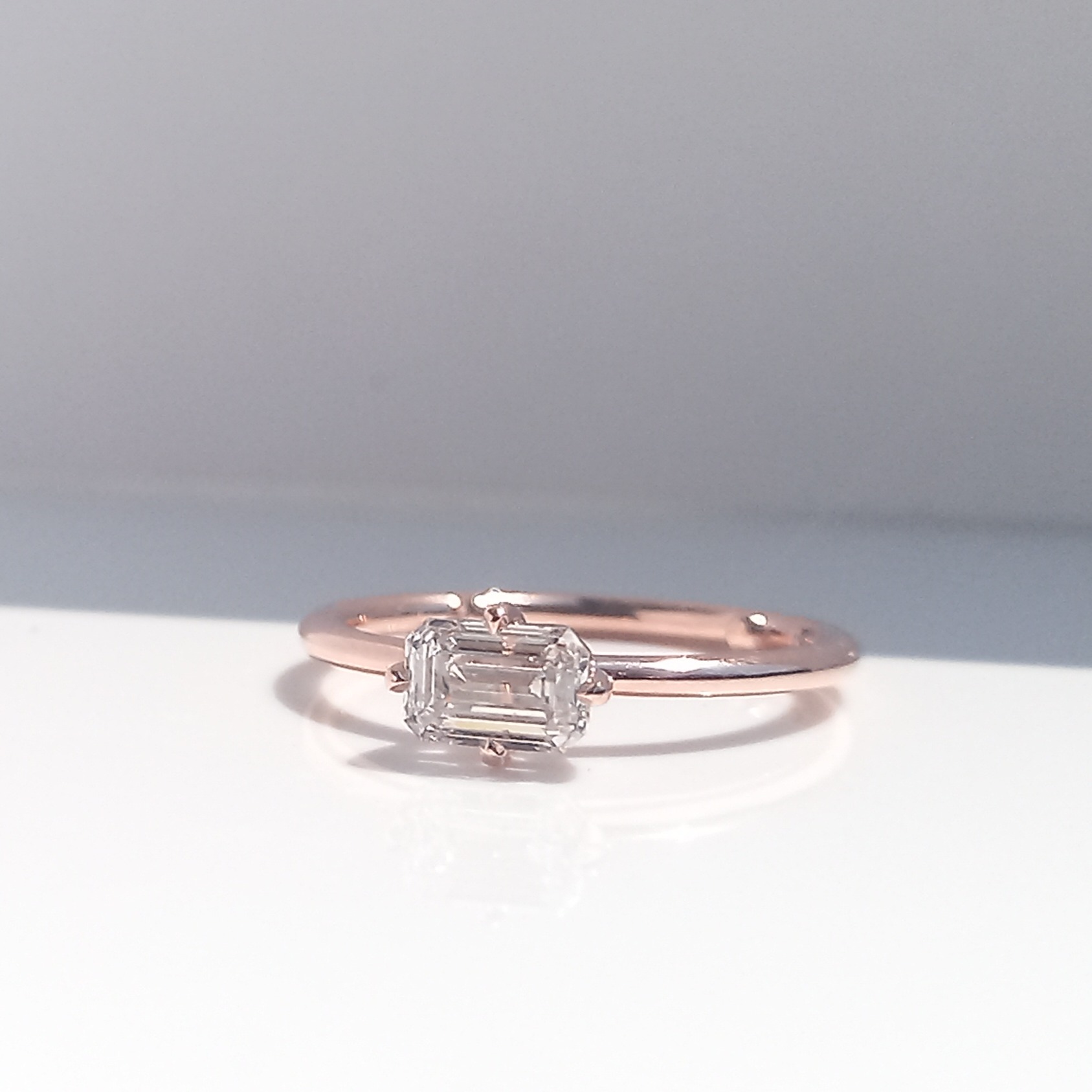 East West Emerald Cut Compass Solitaire Diamond Ring, diamond ring, diamond engagement ring, engagement ring, emerald diamond, danielle camera jewellery