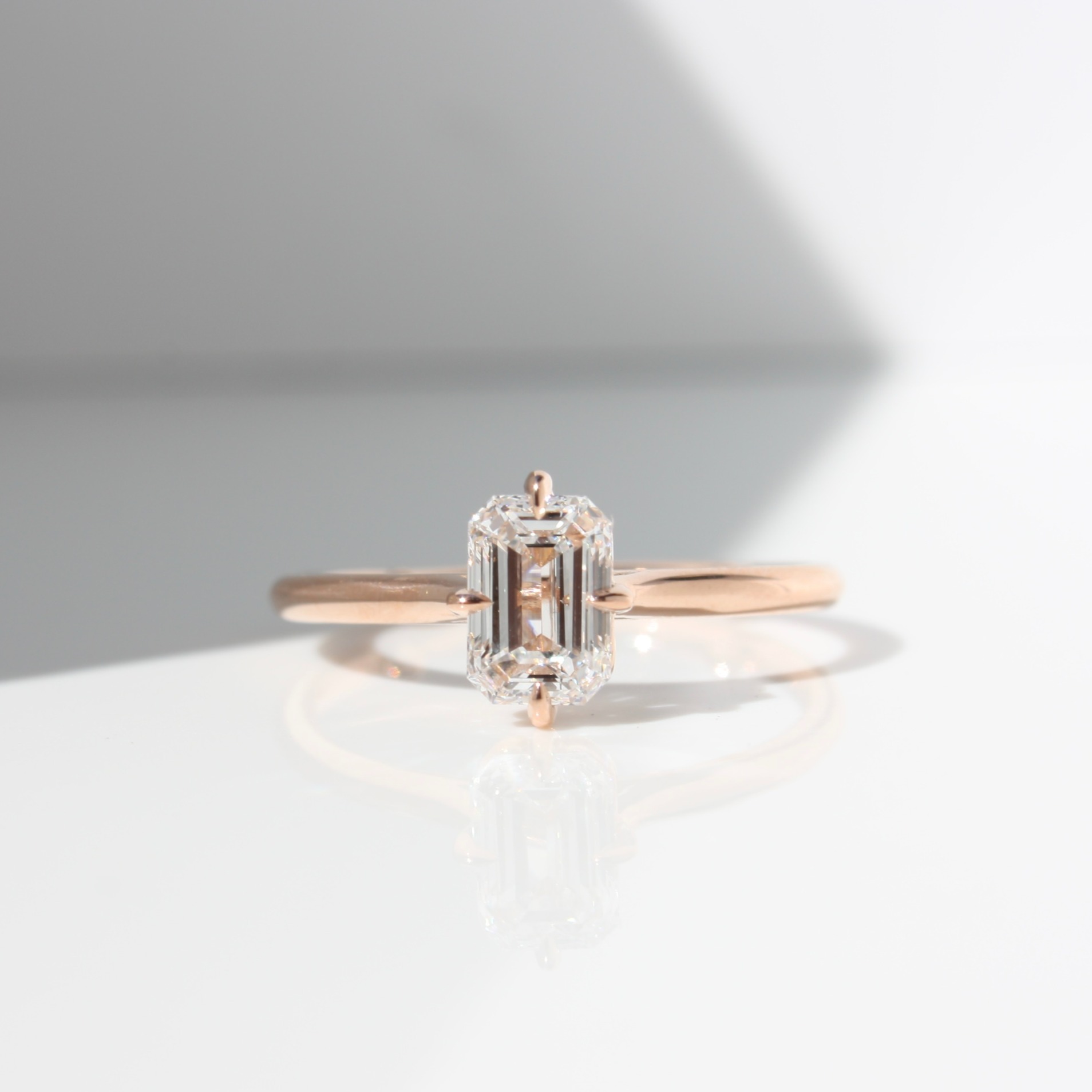 EMERALD CUT COMPASS SOLITAIRE DIAMOND RING, diamond ring, diamond engagement ring, emerald cut diamond, diamond, lab-grown diamond, rose gold ring, compass setting, danielle camera jewellery, The Ultimate Engagement Ring Guide for Men