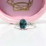 Oval Cosmos Ring, white gold diamond ring, diamond ring, Melanie Casey, lab-grown diamond ring, Engagement ring, lab-grown diamond, Danielle Camera Jewellery, peacock sapphire, teal blue sapphire, oval sapphire, blue sapphire