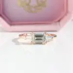East West Trilogy Ring, Emerald & Tapered Baguette-Cut, trilogy ring, three stone ring, engagement ring, emerald cut diamond, laboratory-grown diamond, rose gold ring, recycled gold, danielle camera jewellery
