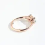 East West Trilogy Ring, Emerald & Tapered Baguette-Cut, trilogy ring, three stone ring, engagement ring, emerald cut diamond, laboratory-grown diamond, rose gold ring, recycled gold, danielle camera jewellery