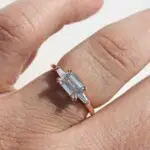 East West Trilogy Ring, Emerald & Tapered Baguette-Cut, trilogy ring, three stone ring, engagement ring, emerald cut diamond, laboratory-grown diamond, rose gold ring, recycled gold, danielle camera jewellery