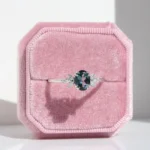 Affodil Cluster engagement ring in recycled gold or platinum with oval centre stone and marquise-cut diamond cluster inspired by daffodil flowers