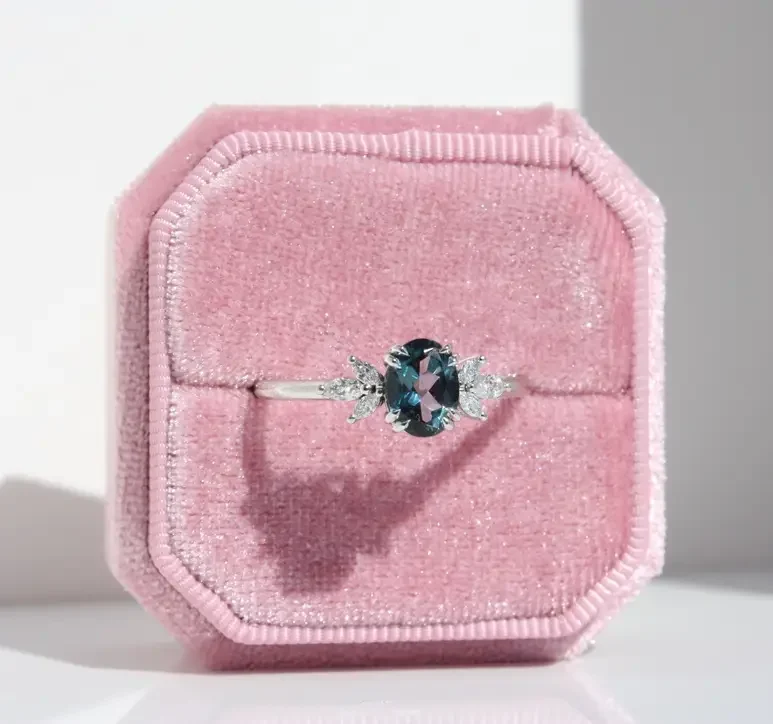 Affodil Cluster engagement ring in recycled gold or platinum with oval centre stone and marquise-cut diamond cluster inspired by daffodil flowers